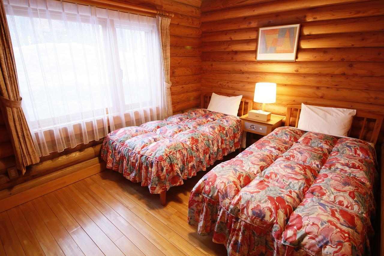 Log Hotel Larch Lake Kanayama Minamifurano Ruang foto