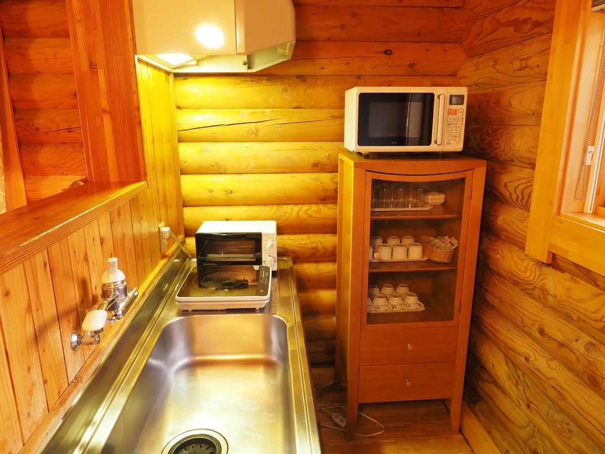 Log Hotel Larch Lake Kanayama Minamifurano Ruang foto