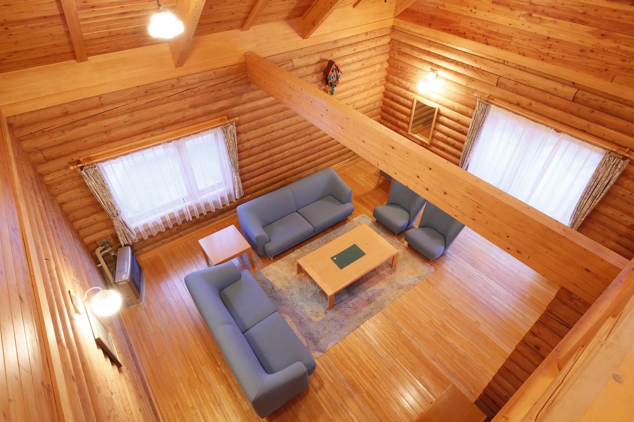 Log Hotel Larch Lake Kanayama Minamifurano Ruang foto